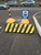 Дорожный блок окрашенный черно-желтый (разметка) ограничитель, барьер #2